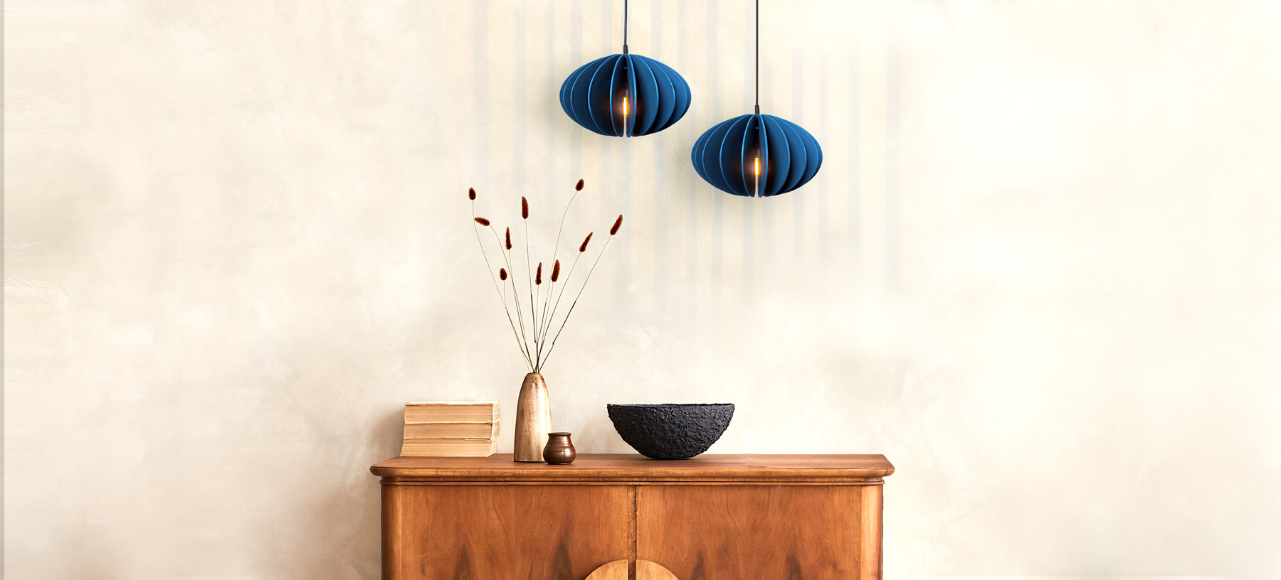 Modern cozy lighting, two pendants lights create the desired warm interior atmosphere