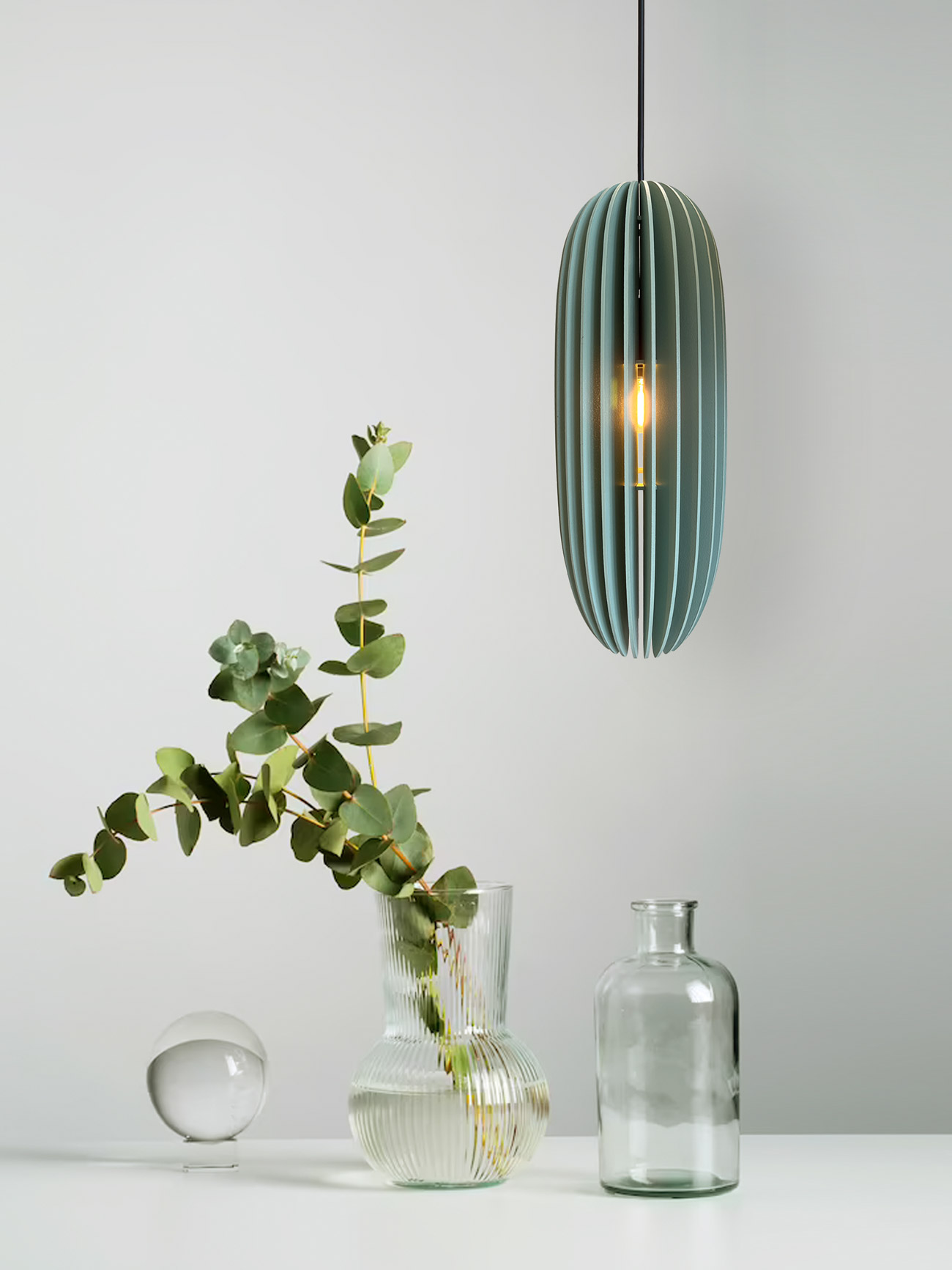 Modern sage-colored pendant lamp with 24 lamellas, perfect for illuminating interior spaces with style.